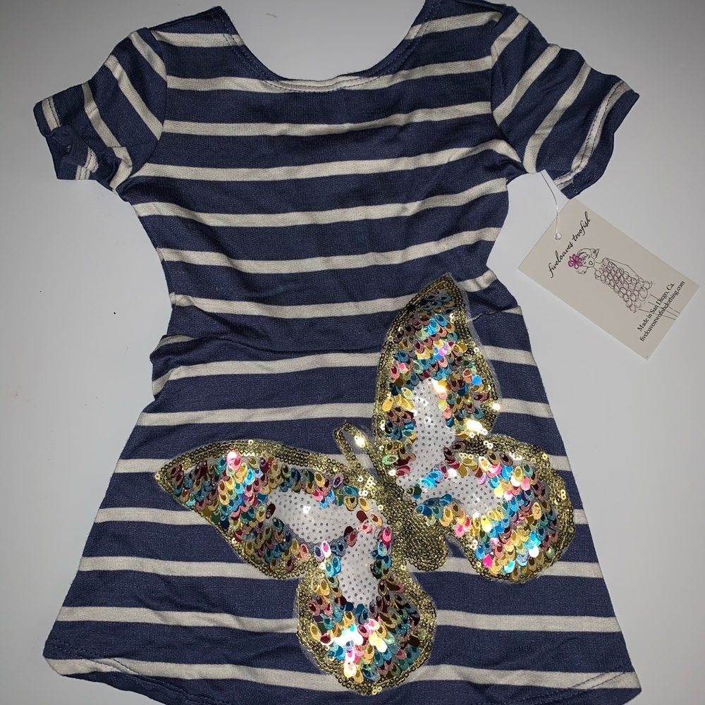 Adorable dress with sequin butterfly on the front